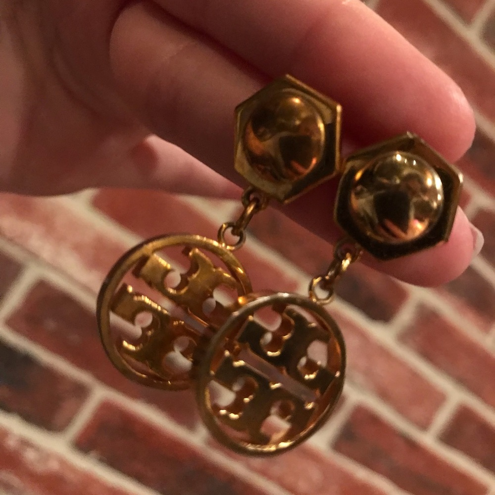 Tory Burch gold dangle earrings with emblem